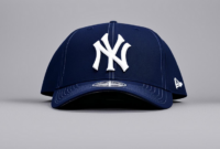 a blue hat with a white logo on it